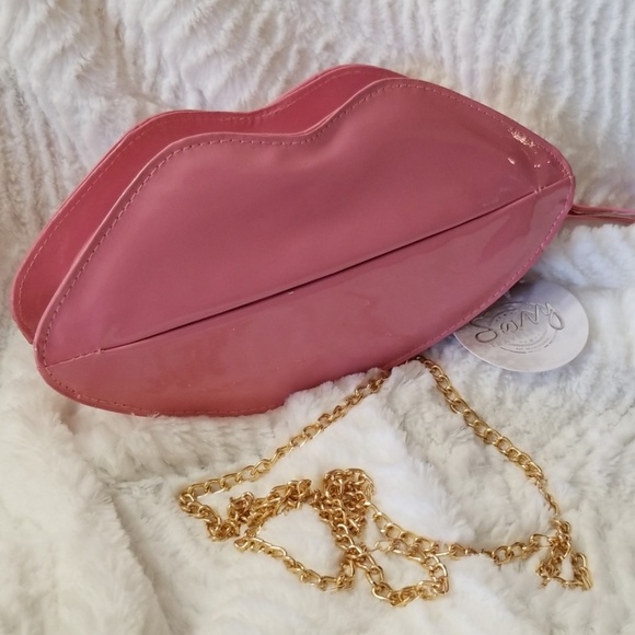 savvy travelers Handbags - Savvy Travelers Smile Hi Clutch Pink Lips Purse